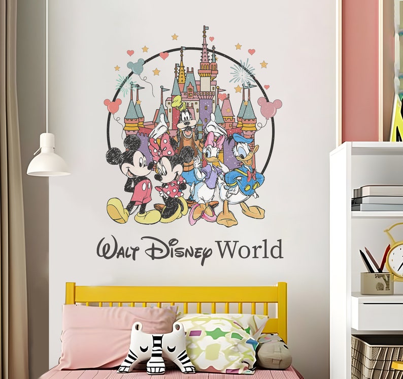 May include: A colorful wall decal featuring Mickey Mouse, Minnie Mouse, Donald Duck, Goofy, and Daisy Duck in front of Cinderella's Castle. The decal also includes the text "Walt Disney World".