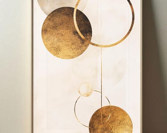 Puede incluir: Impresión artística abstracta con círculos y líneas doradas superpuestas sobre un fondo crema. La obra de arte tiene una apariencia texturizada y metálica, con círculos de varios tamaños y una línea vertical que los conecta. La impresión está enmarcada en un marco de madera de color claro.
