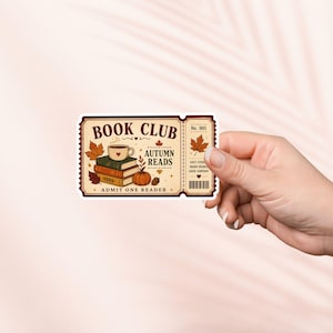 May include: A rectangular sticker shaped like an admission ticket featuring the text BOOK CLUB and AUTUMN READS. The design includes a stack of three books, a steaming cup, a pumpkin, and autumn leaves in shades of orange, brown, and green.