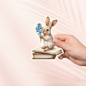 Coniglietto con fiori Adesivo, Adesivo in vinile carino, Adesivi Kindle, Merch libresco, Regalo per gli amanti dei libri, Regalo e-reader, Amante della lettura, Lettore di Smut