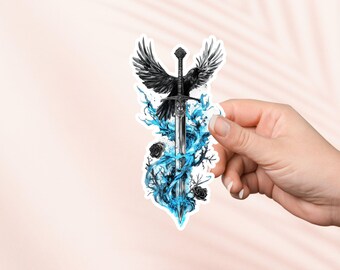 May include: A black crow with outstretched wings perched on a silver sword. The sword is surrounded by blue flames and black roses.