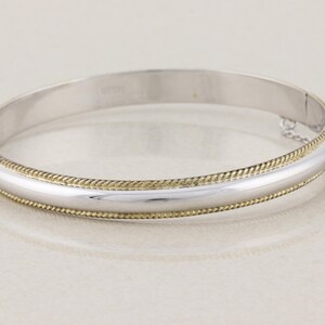 Sterling Silver Bangle Bracelet with Gold Plated Rope Border Opens  7 1/4 and (2 3/8" inch diameter)