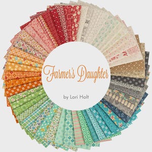 May include: A circular arrangement of fabric strips featuring a diverse array of patterns including florals, plaids, and geometric shapes in a full spectrum of colours. A central white circle displays the text Farmer's Daughter by Lori Holt.
