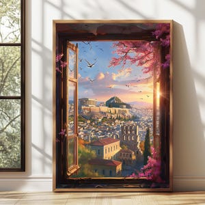 Puede incluir: Una impresión artística enmarcada que representa una vista panorámica de una ciudad a través de una ventana abierta. La obra de arte muestra una vibrante puesta de sol sobre un paisaje urbano con edificios históricos, pájaros y ramas florales rosas. El marco es de madera oscura.