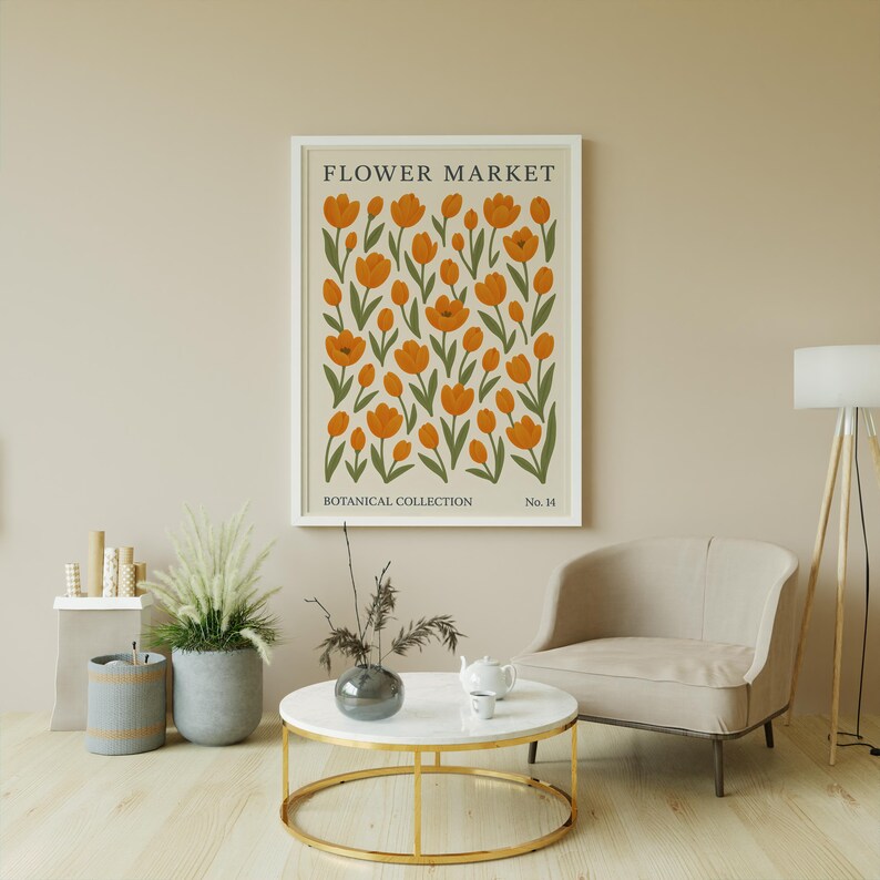 K&ouml;nnte beinhalten: Ein gerahmter Druck mit einer botanischen Illustration von orangefarbenen Blumen mit gr&uuml;nen Stielen und Bl&auml;ttern. Der Druck tr&auml;gt den Text "FLOWER MARKET" oben und "BOTANICAL COLLECTION No. 14" unten.