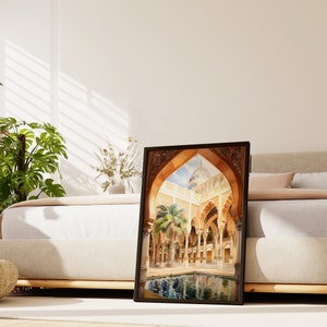 May include: A framed print of a watercolour painting depicting an ornate courtyard with a reflecting pool and palm trees. The courtyard is surrounded by arches and columns, and a domed building can be seen in the distance.