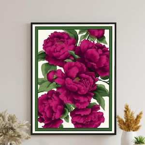 May include: A framed print featuring a cluster of vibrant magenta peonies with green leaves against a white background. The frame has a black border and a green inner border.