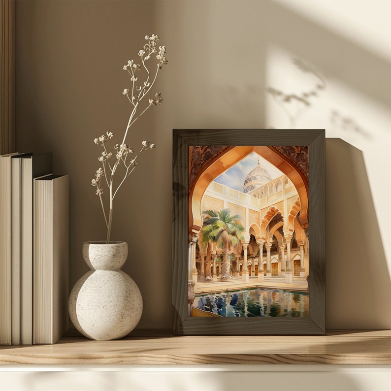 May include: A framed watercolour painting depicting a courtyard with a reflecting pool and a mosque in the background. The courtyard is surrounded by arches and columns, and there is a palm tree in the centre.