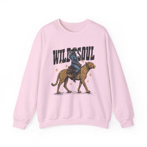 Rodeo Wear Sweatshirt Leopard Cowgirl Design Western Style Crewneck Wild Soul Print Vintage Inspired Fashion Country Ranch Clothing Collection Comfortable Cotton Polyester Blend Casual Western Outfit Unisex Adult Sizing Fall Winter