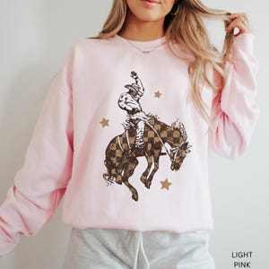 Western Cowboy Sweatshirt Retro Design Checkered Pattern Bucking Bronc Graphic Crewneck Pullover Top Rodeo Style Ranch Wear Country Outfit image 6