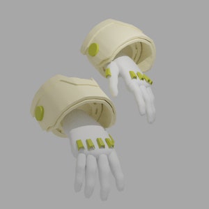 Puede incluir: Dos manos blancas con acentos amarillos en los nudillos y las muñecas. Las manos llevan guantes de color crema con acentos amarillos.