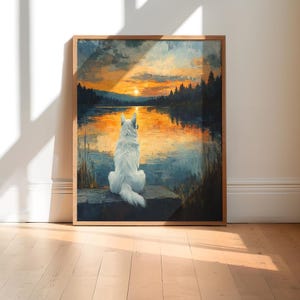 May include: A white dog sits on a rock overlooking a lake at sunset. The sky is a vibrant orange and yellow, and the water reflects the colors of the sky. The dog is looking out at the lake, and the trees in the background are silhouetted against the sunset.