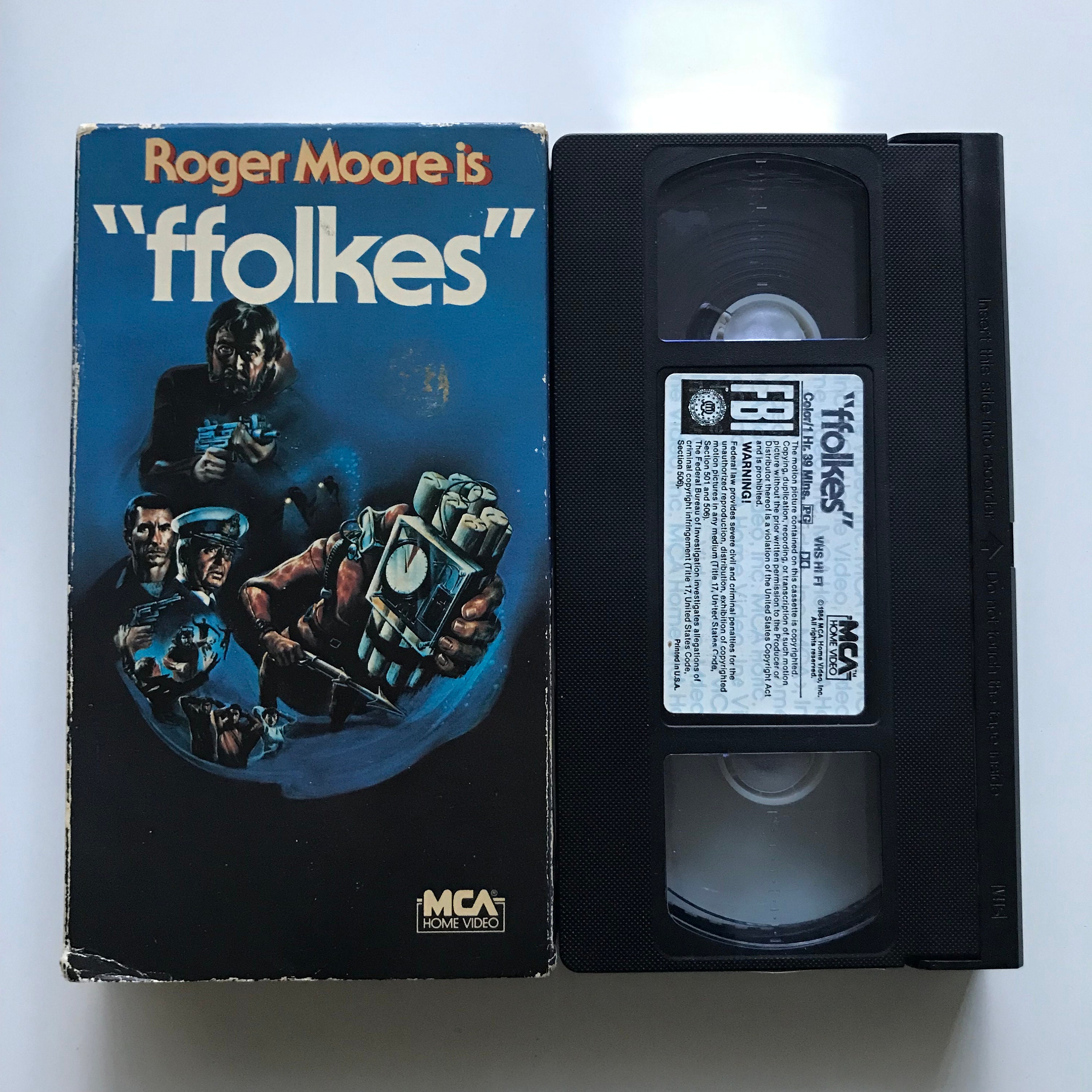 Vintage Ffolkes VHS Tape MCA Home Video 80s Roger Moore