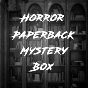 May include: Black and white image featuring the text "HORROR PAPERBACK MYSTERY BOX" in a stylized font. The text is superimposed over a backdrop of a bookshelf filled with books, creating a vintage, gothic aesthetic.