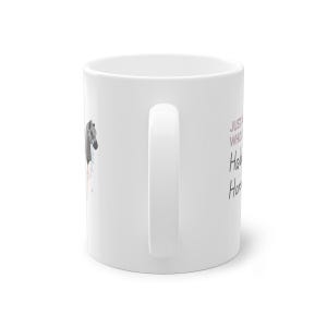 May include: White ceramic mug with a black and white horse illustration and the text "Just a girl who loves horses" in pink.