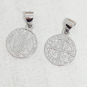 May include: A set of three ceramic mugs with a speckled, matte finish. The mugs are in shades of cream, light gray, and dark gray. Each mug has a simple, minimalist design, perfect for coffee or tea.