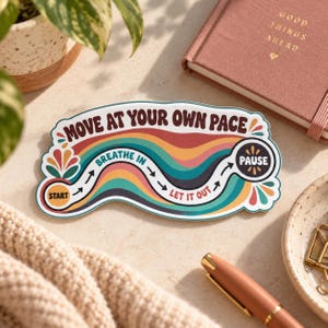 May include: A die-cut sticker featuring a wavy, multi-colored design with the text MOVE AT YOUR OWN PACE. The graphic includes a START circle, arrows, the phrases BREATHE IN and LET IT OUT, and a circular PAUSE icon with a sunburst pattern.