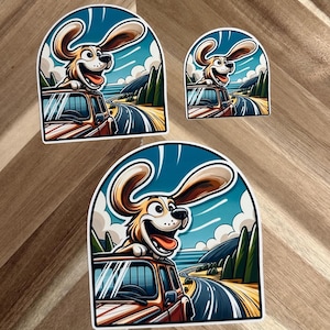 Mountain Bliss: blije hond | Sticker auto rijdende hond