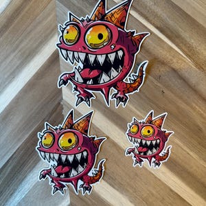 Pink Monster Sticker | Cute Cartoon Creature Vinyl Decal | Gaming Character Art | Waterproof Laptop Sticker