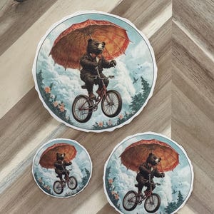 Charming Rainy Day Bicycle Ride Sticker