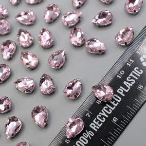 14x10mm Set of 15 Light Pink Glass Teardrop Rhinestones  – 14 x 10 mm  Soft / Baby Pink Glass Silver Sew-On Crystals for DIY & Crafting