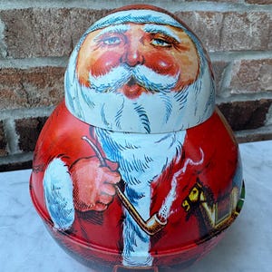 Vtg 1980s Tin Christmas Figure Roly Poly Santa Pipe Tobacco Container Jar Decor