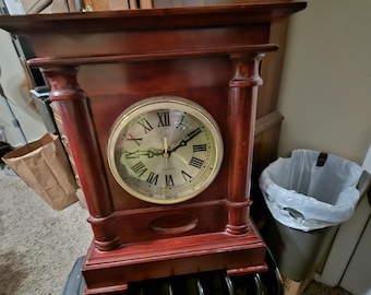 Cherry looking Wood Clock - Real wood & It is a Unbranded named clock. Works fine, no issues, no chime on it.