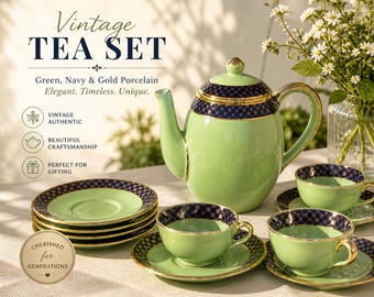 Juego de té de porcelana vintage verde, azul marino y dorado: tazas y platillos de elegante estilo art déco.