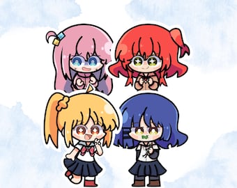 May include: Four cartoon stickers featuring anime-style characters with large eyes and colorful hair. The characters have pink, red, yellow, and blue hair, and are wearing school uniforms. The background is a light blue watercolor wash.