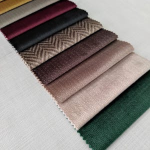 Luxurious velvet upholstery fabric available in 25 colors. High-quality, durable, and perfect for elegant furniture. Sold by the yard.
