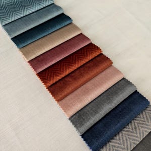 Luxurious velvet upholstery fabric available in 25 colors. High-quality, durable, and perfect for elegant furniture. Sold by the yard.