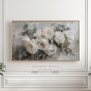 May include: A painting of a bouquet of white roses with green leaves on a light gray background. The painting is framed in a gold frame.