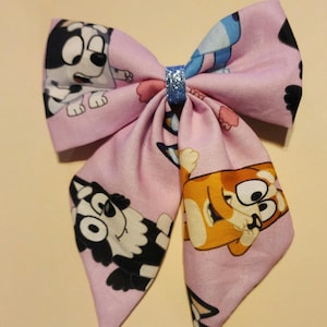 Eye-catching Bluey Hair Bow: Adding a Touch of Bluey Cartoon Charm with a Pink Bow Hair