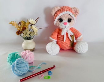 Bear girl in pajamas , night cap and bunny booties. Amigurumi , plush stuffed toy