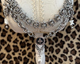 Fleur de lis and rattlesnake vertebrate Chainmail necklace