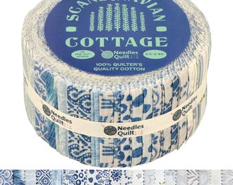 May include: A jelly roll of 40 fabric strips labelled Scandinavian Cottage by Needles Quilt Studio. The roll features blue and white patterned cotton fabric strips, each measuring 6.35 cm by 111.76 cm, secured with a branded ribbon.