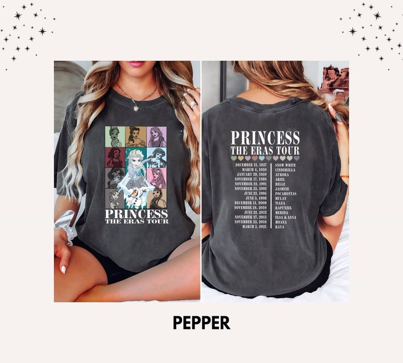 May include: A black t-shirt with a graphic of Disney princesses and the text "Princess The Eras Tour". The back of the shirt has a list of dates and princess names.