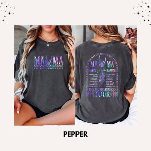 May include: A black t-shirt with a rainbow iridescent graphic print that says "Mama" with a hand gesture and "The Motherhood Tour". The back of the shirt says "Some days it rocks me either way we're rockin' Mama Make it all happen The Motherhood Tour".