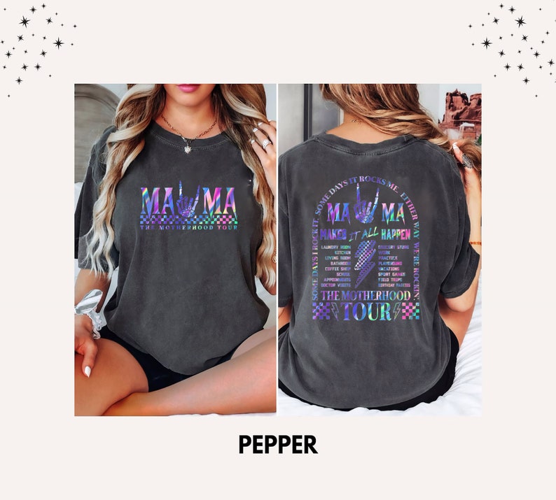 May include: A black t-shirt with a rainbow iridescent graphic print that says "Mama" with a hand gesture and "The Motherhood Tour". The back of the shirt says "Some days it rocks me either way we're rockin' Mama Make it all happen The Motherhood Tour".