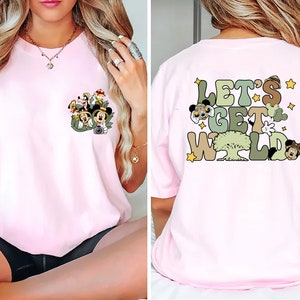 May include: Pink t-shirt with a graphic of Mickey Mouse and friends on the front and the text "Let's Get Wild" on the back.