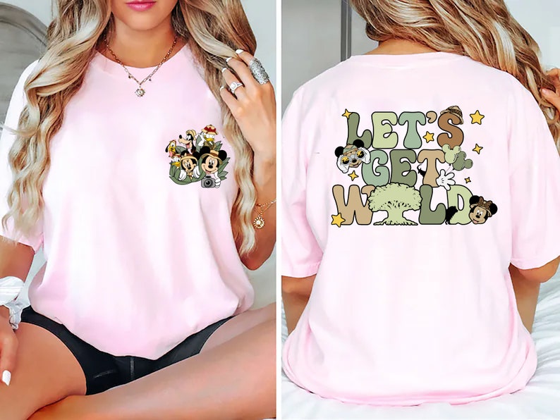May include: Pink t-shirt with a graphic of Mickey Mouse and friends on the front and the text "Let's Get Wild" on the back.