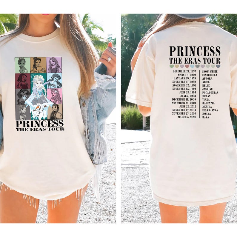 May include: A white t-shirt with a graphic of Disney princesses and the text "Princess The Eras Tour". The back of the shirt has a list of Disney princess movies and their release dates.