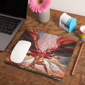 May include: A colorful mouse pad with a fantasy illustration of a person with red wings. The person is standing in a field with a bright sky in the background.