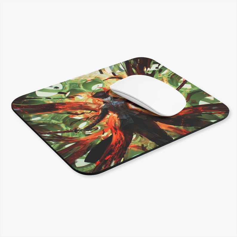 May include: A green, red, and orange mousepad with a stylized image of a person in a black outfit with a red and orange background. The person is surrounded by green and orange vines.