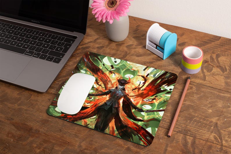 May include: A colorful mousepad with a graphic of a person in a black coat and hat standing in a field of red and green. The person is surrounded by a swirling pattern of red and green.