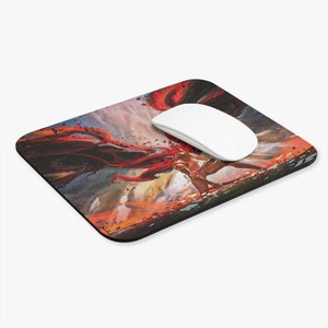 May include: A mousepad with a colorful illustration of a figure in a red cape and a dark figure in the background. The figure in the cape is holding a sword and the dark figure is holding a staff. The background is a cloudy sky with a sunset.
