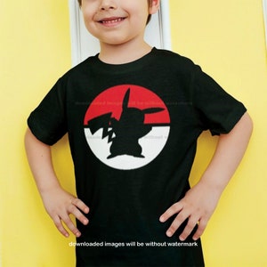 May include: A black t-shirt with a red and white circle graphic featuring a silhouette of a Pokemon character. The text "downloaded images will be without watermark" appears twice on the shirt.