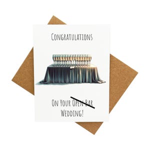 Table avec carte de voeux champagne le jour du mariage [Légende : Félicitations pour votre mariage Open Bar !] - Livré avec enveloppe