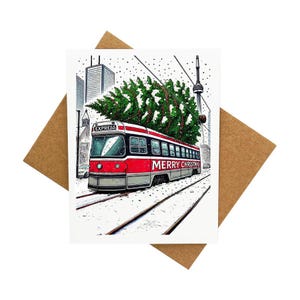 Carte de voeux de Noël de Toronto - Tramway avec arbre de Noël au sommet et tour CN [Légende : Joyeux Noël] - Livrée avec enveloppe