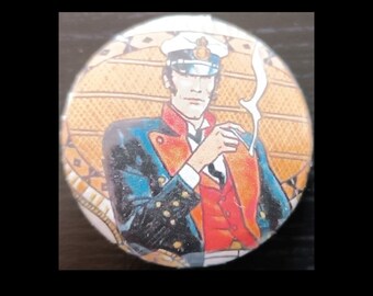 Ensemble de Badges BD Ø 32mm - Égayez votre tenue avec vos héros préférés !